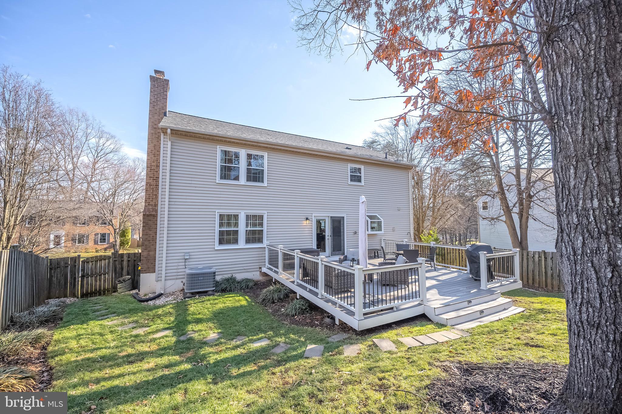 10655 John Ayres Drive Fairfax, VA 22032 - Photo 40 of 57 a view of a house with a yard chairs and iron fence