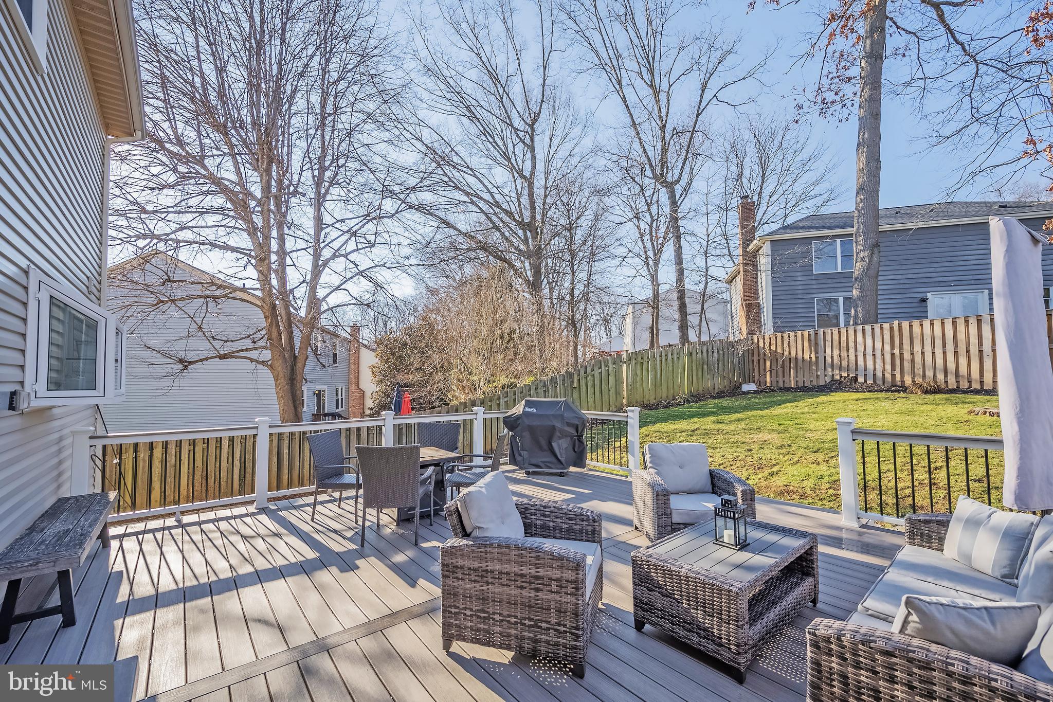 10655 John Ayres Drive Fairfax, VA 22032 - Photo 43 of 57 a view of a patio with couches chairs and wooden floor
