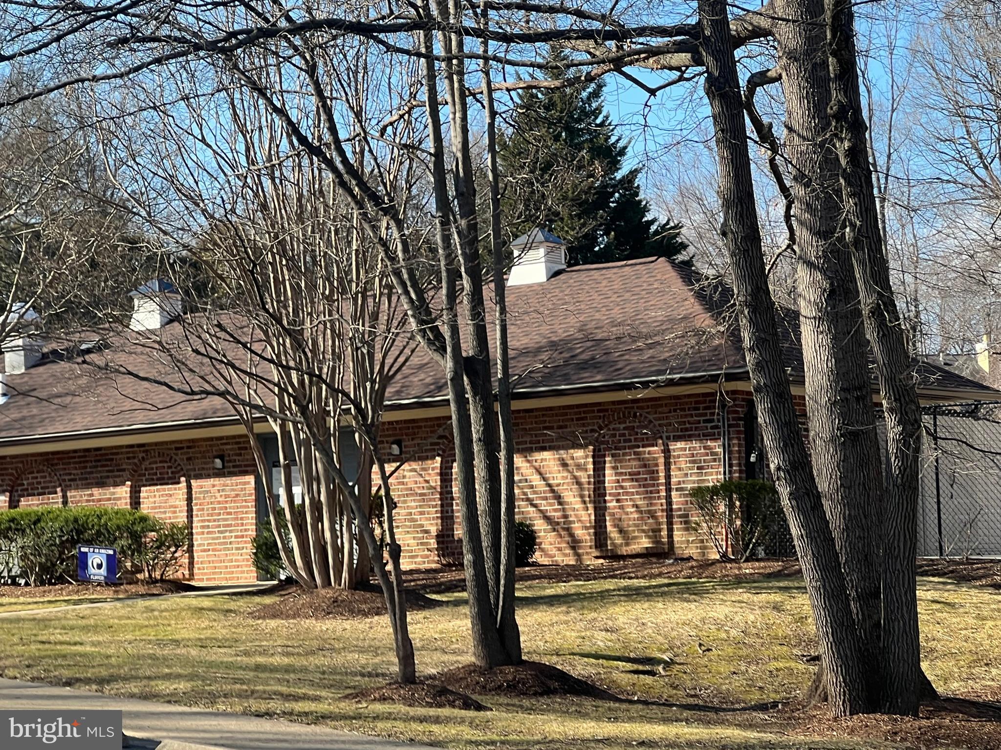 10655 John Ayres Drive Fairfax, VA 22032 - Photo 50 of 57 a view of a house with a tree next to a yard