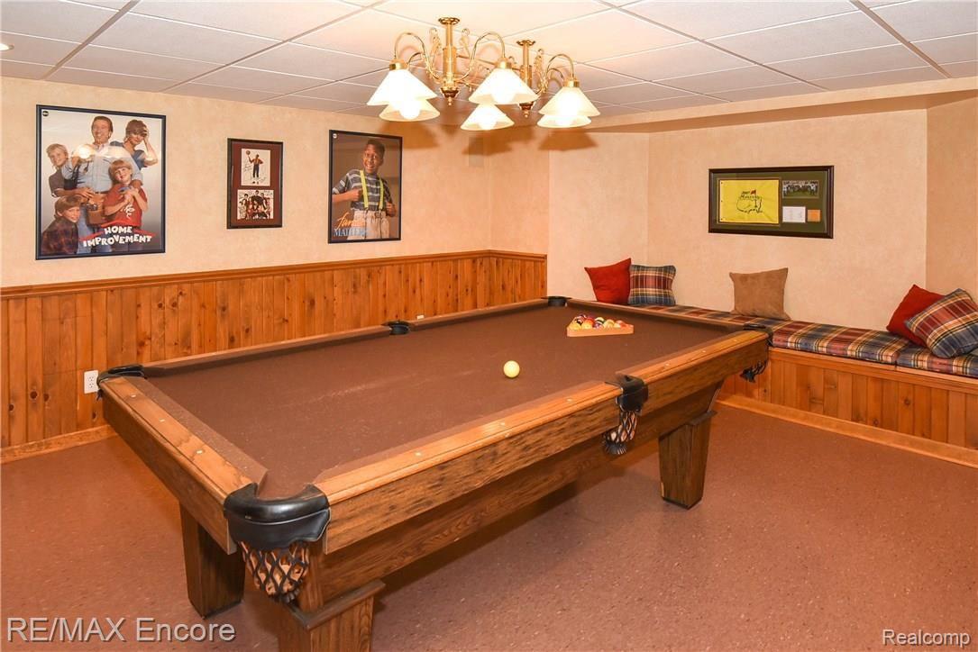 1284 Pebble Pointe Drive Rochester, MI 48307 - Photo 67 of 85 Pool room with built in storage under cushions keeps things clean and tidy