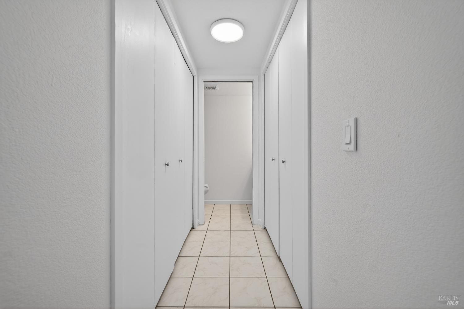 305 Westmont Place Santa Rosa, CA 95401 - Photo 10 of 31 Storage on left; Laundry Closet on Right, 1/2 bath at end