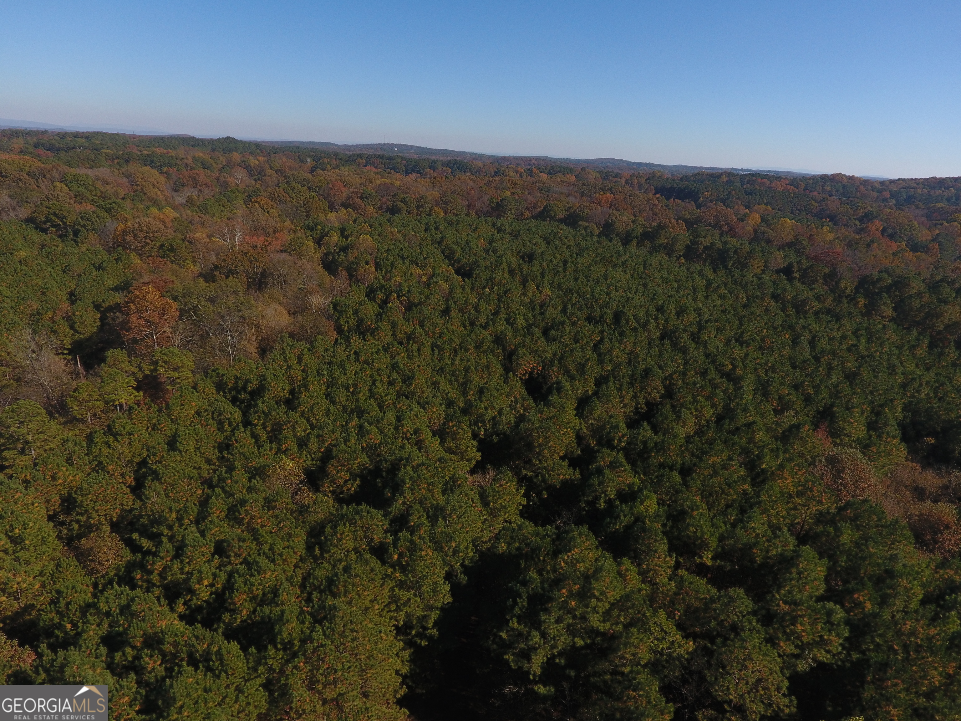 0 Hall Memorial Road, Unit 9595 Calhoun, GA 30703 - Photo 27 of 29 a view of a city with mountains in the background