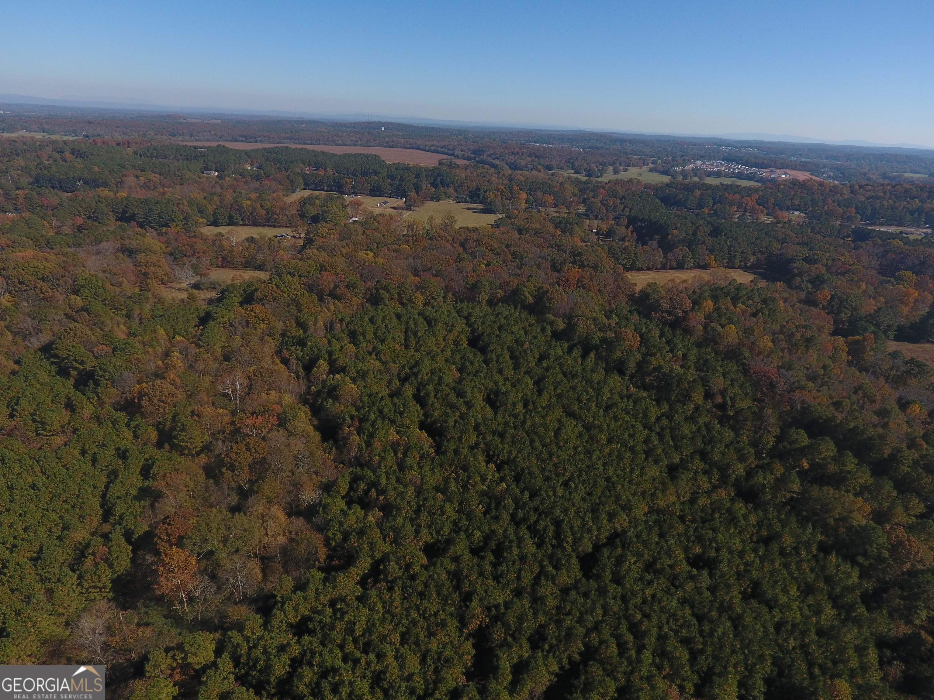 0 Hall Memorial Road, Unit 9595 Calhoun, GA 30703 - Photo 29 of 29 an aerial view of house with yard and mountain view in back