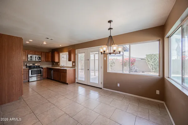 a view of kitchen with furniture and window