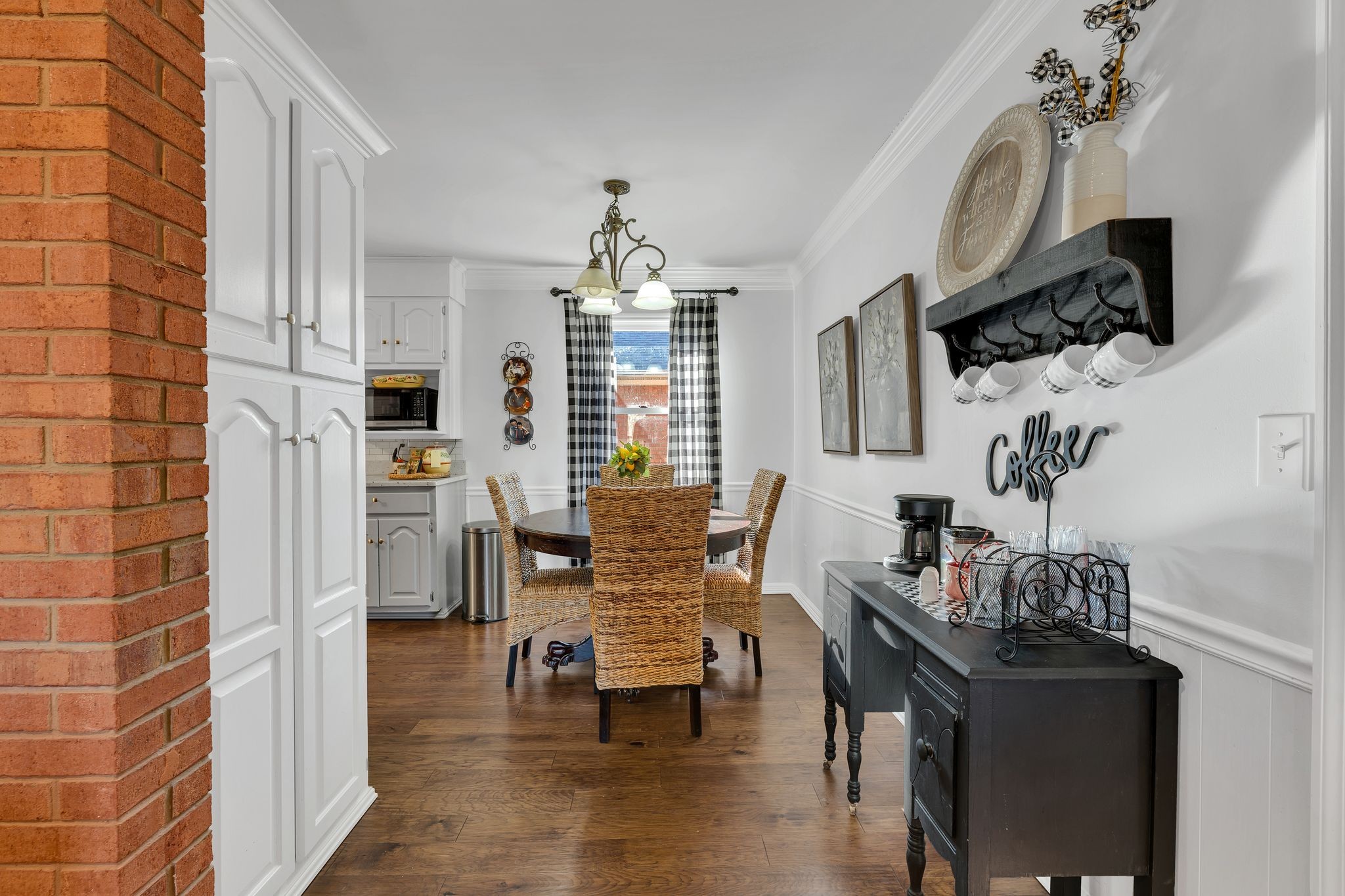 729 Rabbit Trail Road Leoma, TN 38468 - Photo 13 of 52 a living room with furniture a flat screen tv and kitchen view