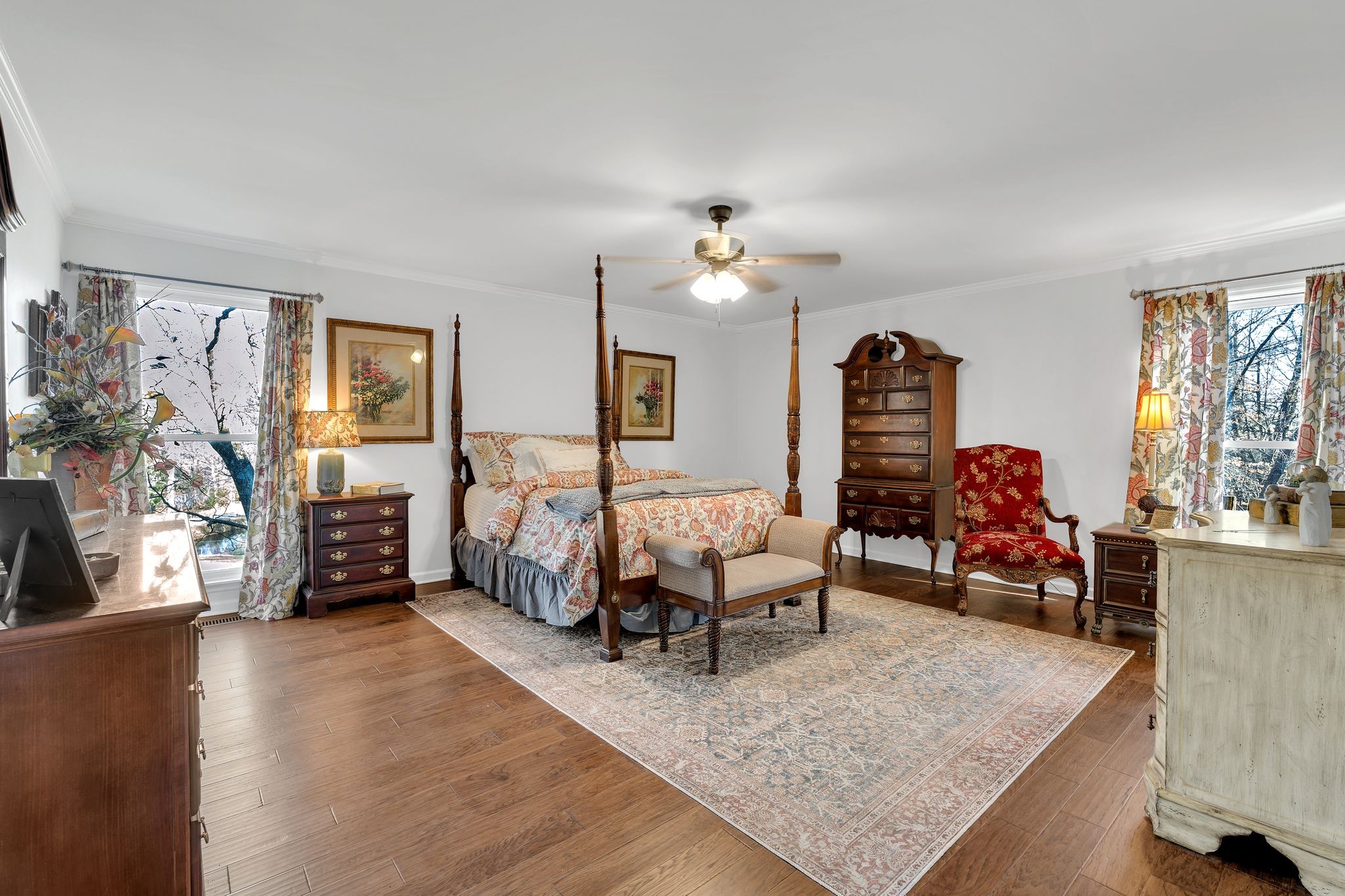 729 Rabbit Trail Road Leoma, TN 38468 - Photo 16 of 52 a bed room with furniture and a chandelier