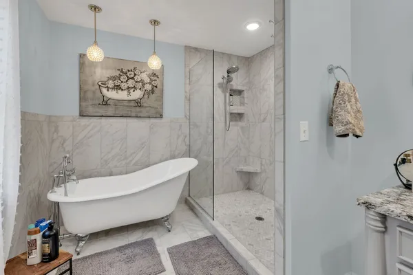 a bathroom with a shower and a toilet