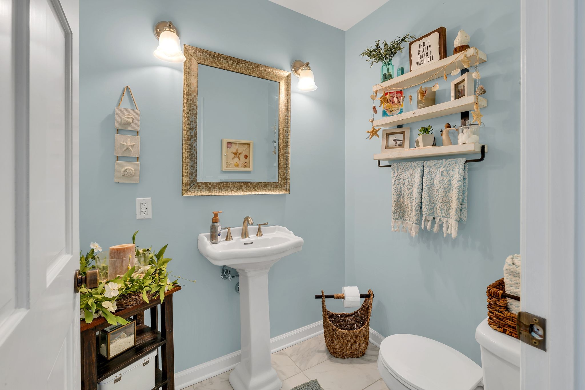 729 Rabbit Trail Road Leoma, TN 38468 - Photo 23 of 52 a bathroom with a sink mirror and toilet