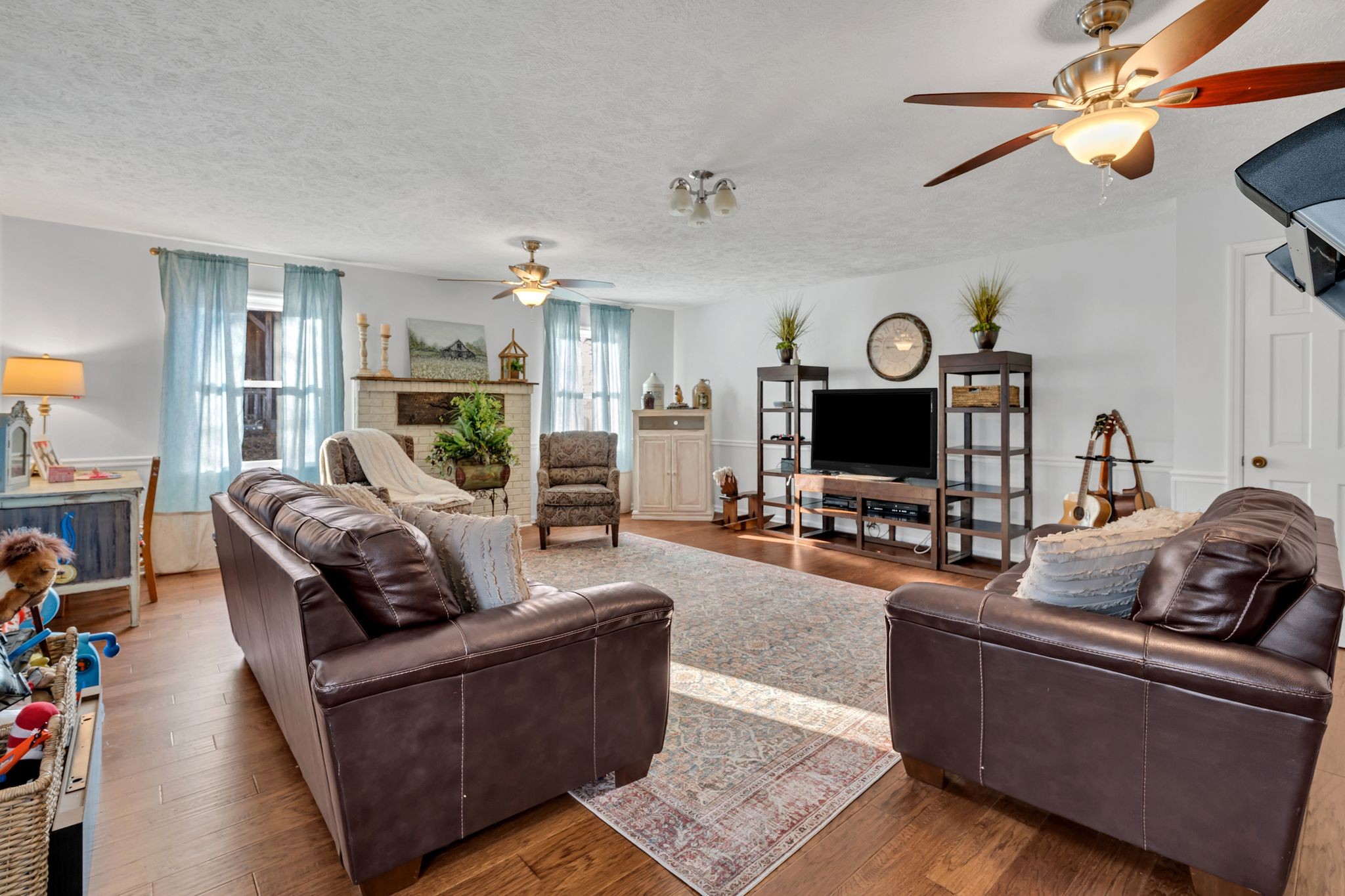 729 Rabbit Trail Road Leoma, TN 38468 - Photo 26 of 52 a living room with furniture and a flat screen tv