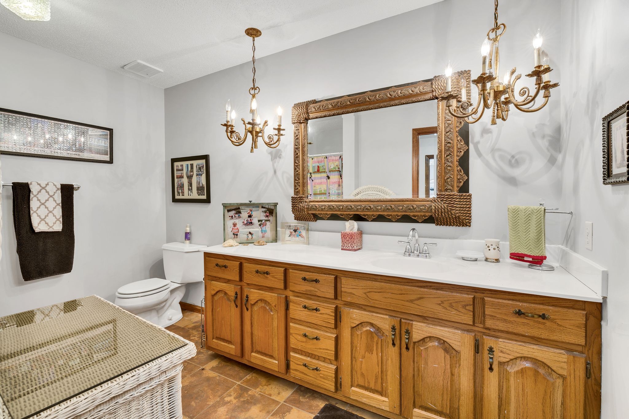 729 Rabbit Trail Road Leoma, TN 38468 - Photo 28 of 52 a spacious bathroom with double sink a toilet a mirror and shower curtain