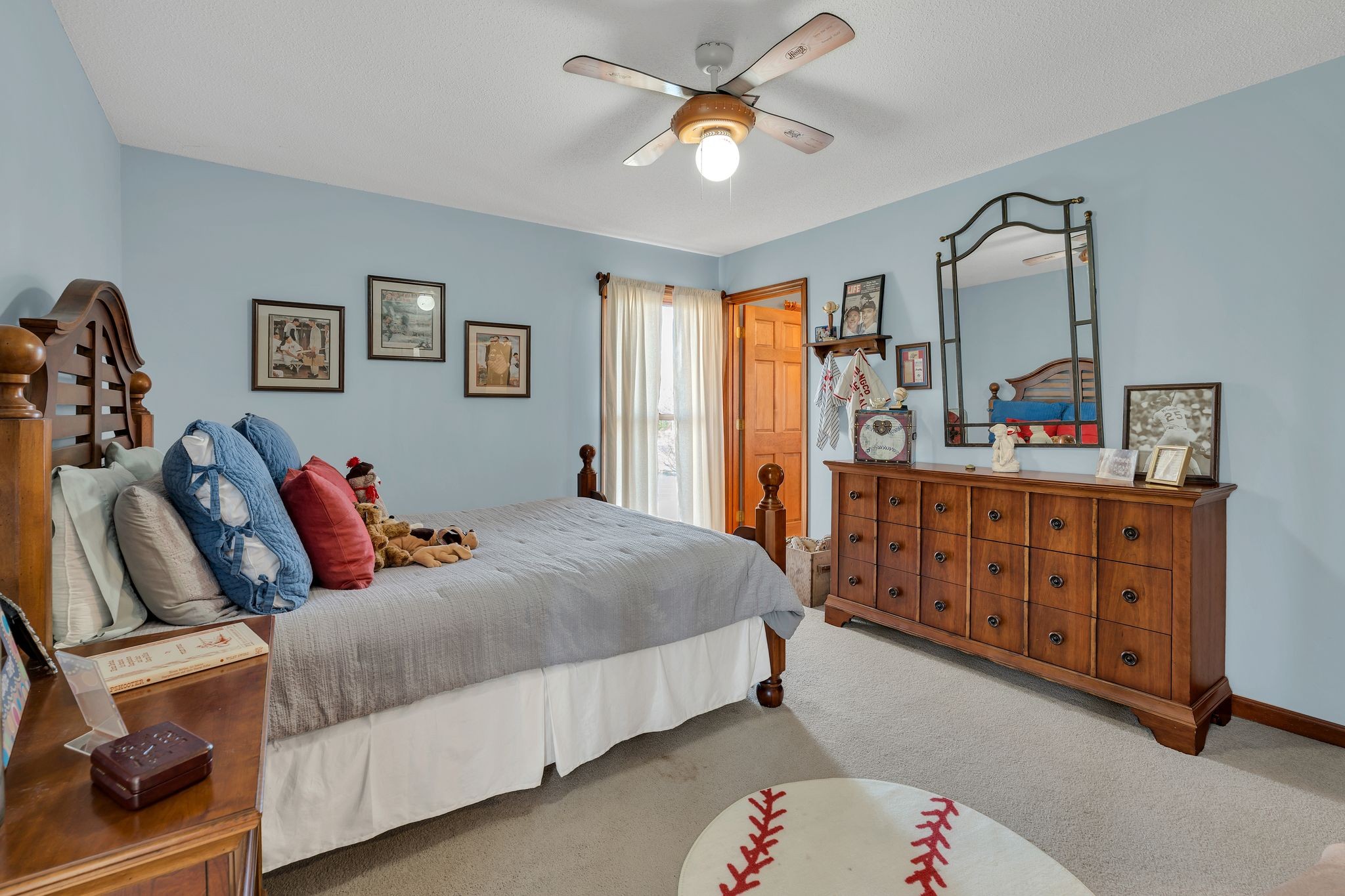 729 Rabbit Trail Road Leoma, TN 38468 - Photo 33 of 52 a bedroom with a bed dresser and wooden floor