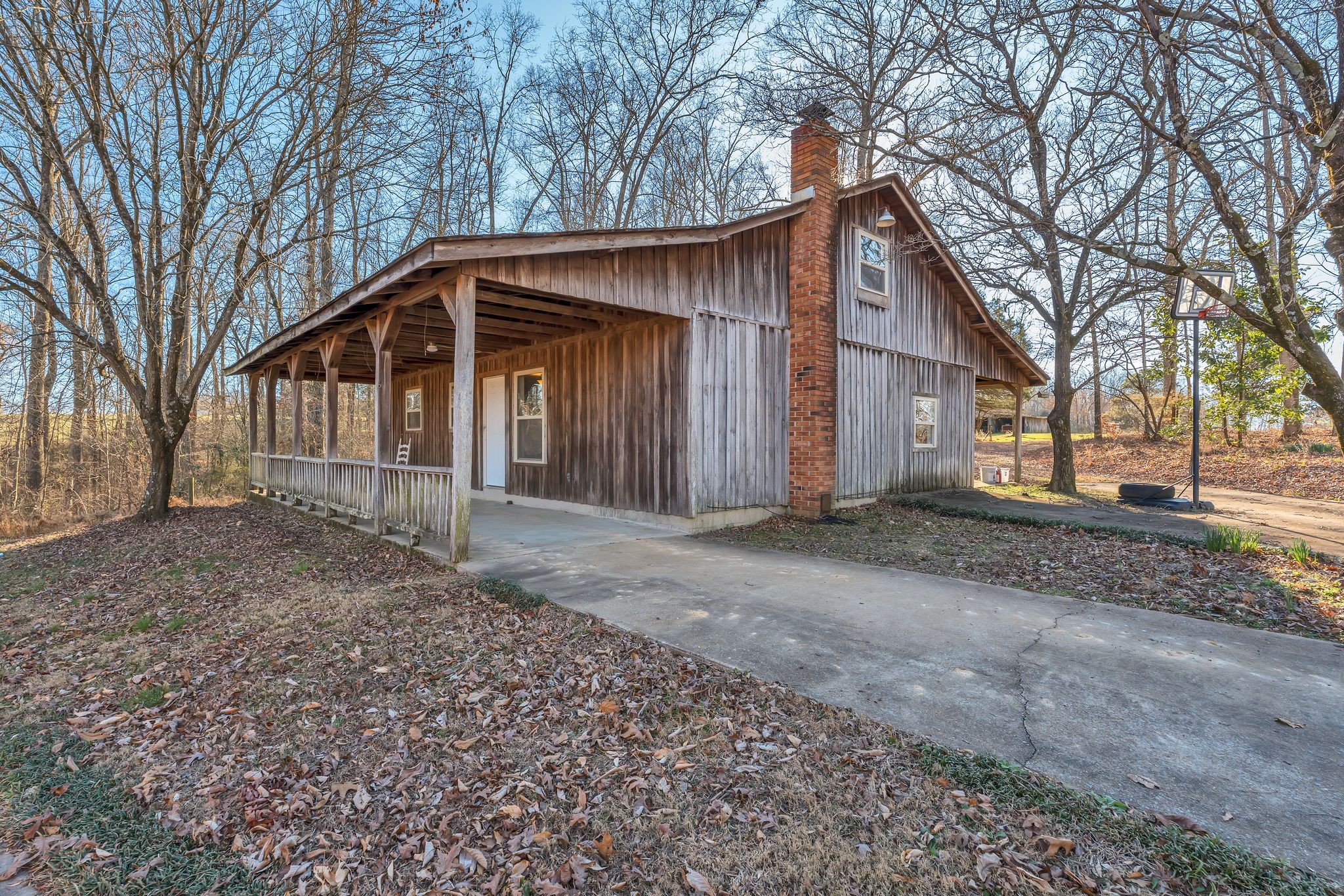 729 Rabbit Trail Road Leoma, TN 38468 - Photo 37 of 52 a front view of a house with a yard and garage