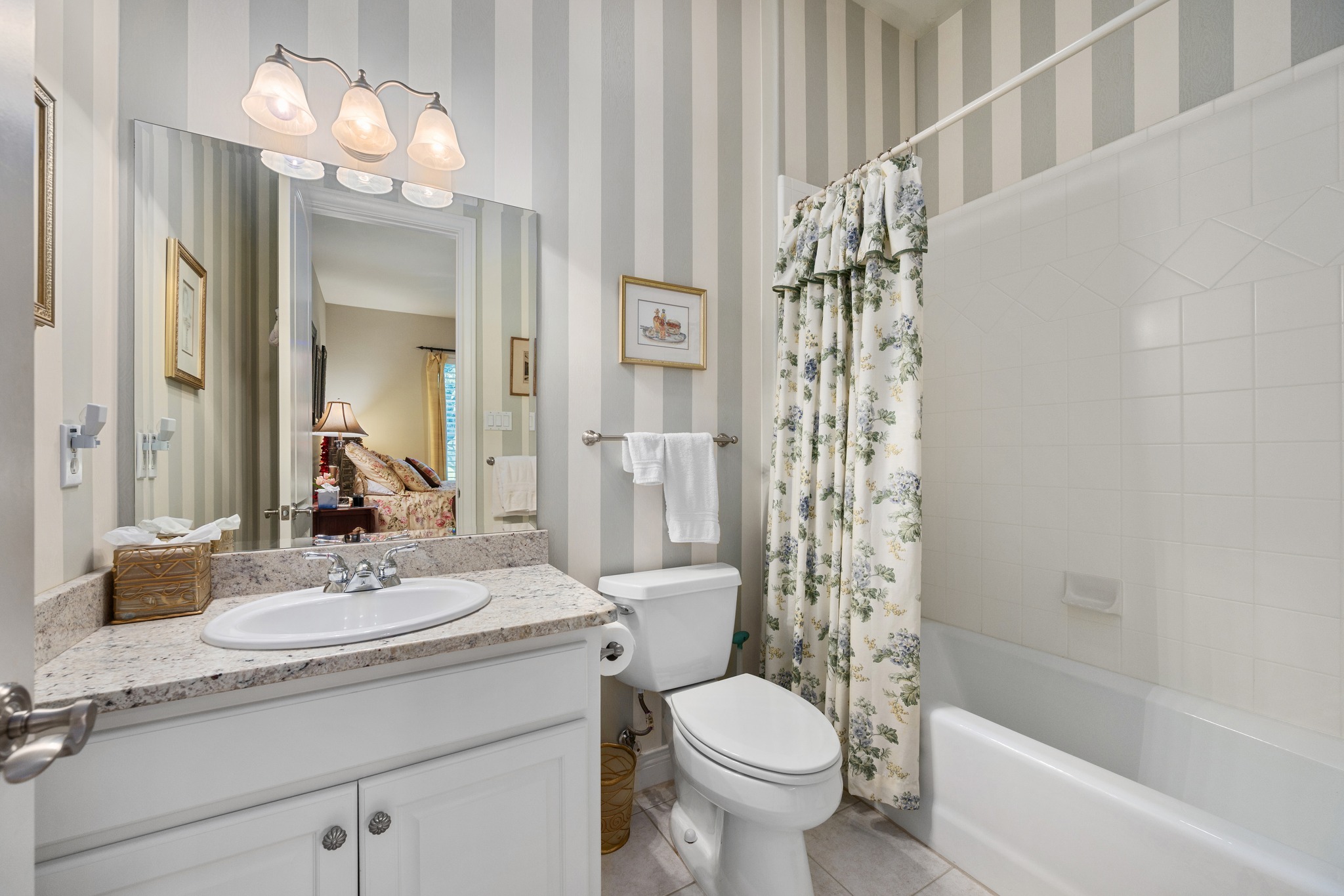 29 Meadows End Georgetown, TX 78628 - Photo 25 of 38 a bathroom with a sink a toilet a large mirror and shower