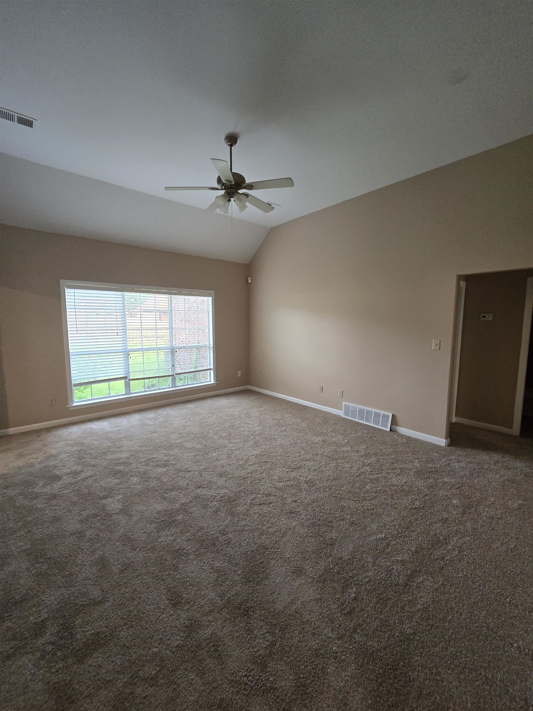 5186 Guffin Road Bartlett, TN 38135 - Photo 8 of 21 a view of an empty room with a window