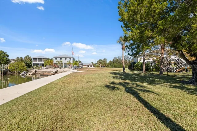 a view of residential houses with outdoor space