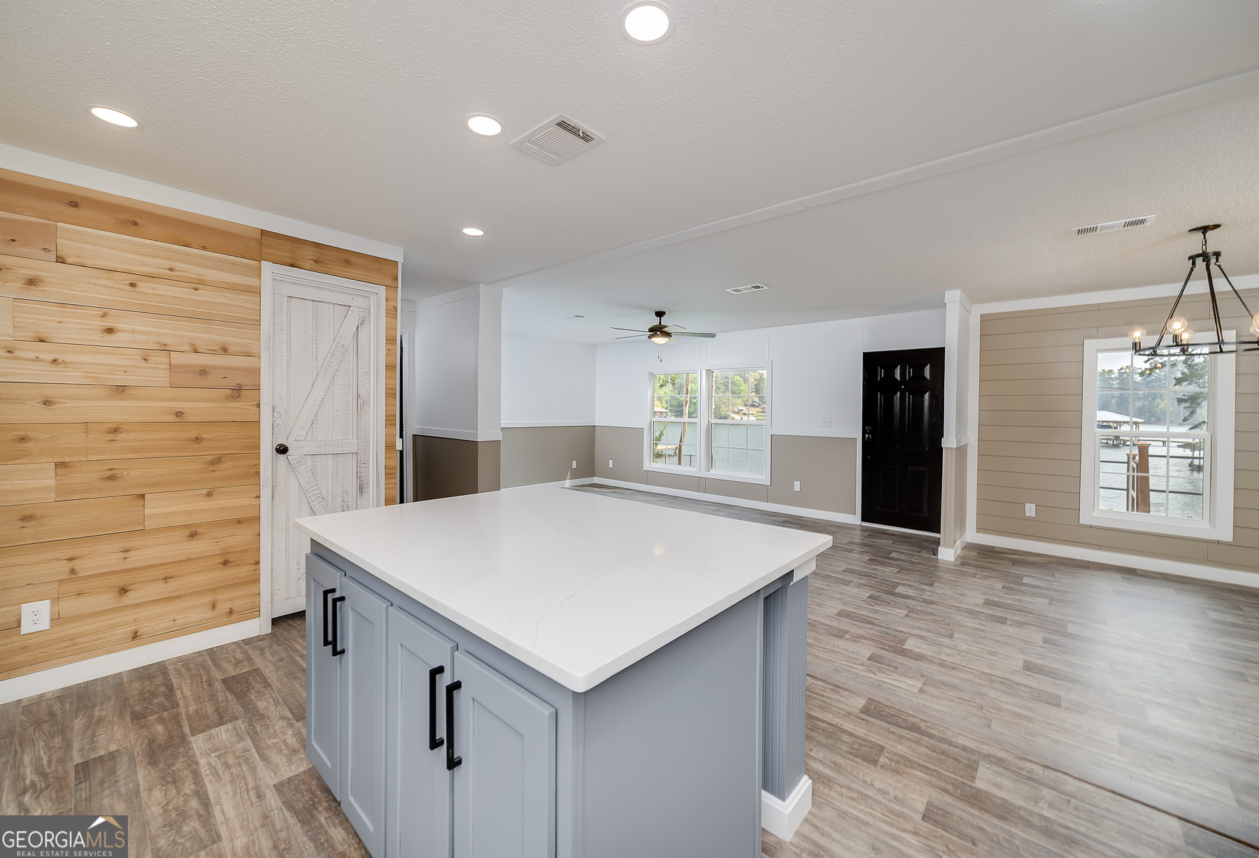 595 Barnetts Bridge Road Jackson, GA 30233 - Photo 23 of 47 a view of kitchen with center island and wooden floor