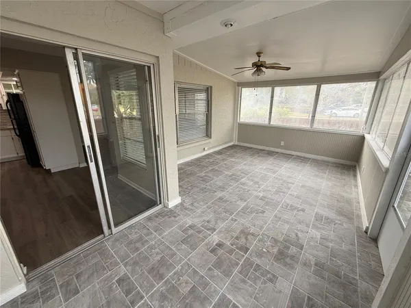 an empty room with windows