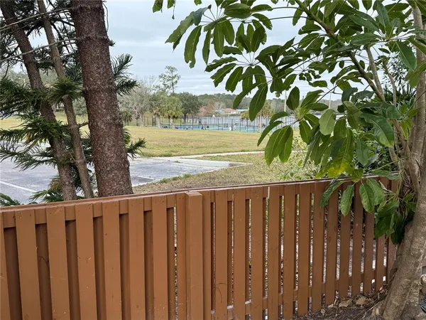 a view of a wooden fence