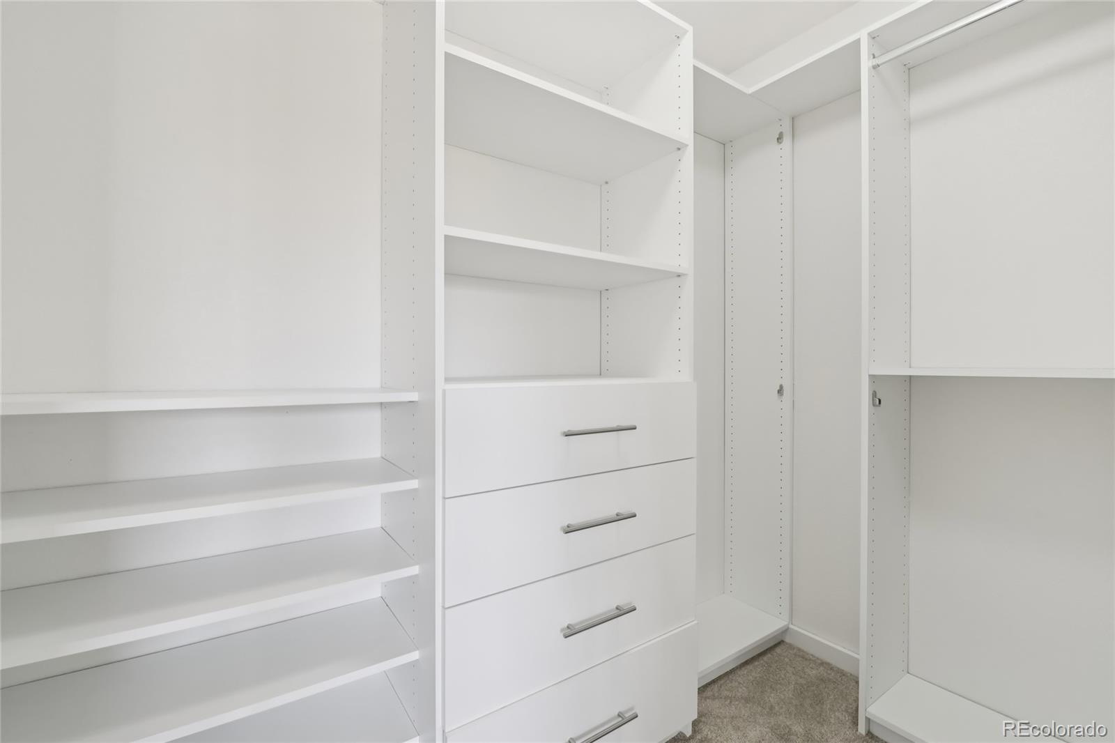 11340 Locust Street Thornton, CO 80233 - Photo 13 of 33 a view of walk in closet