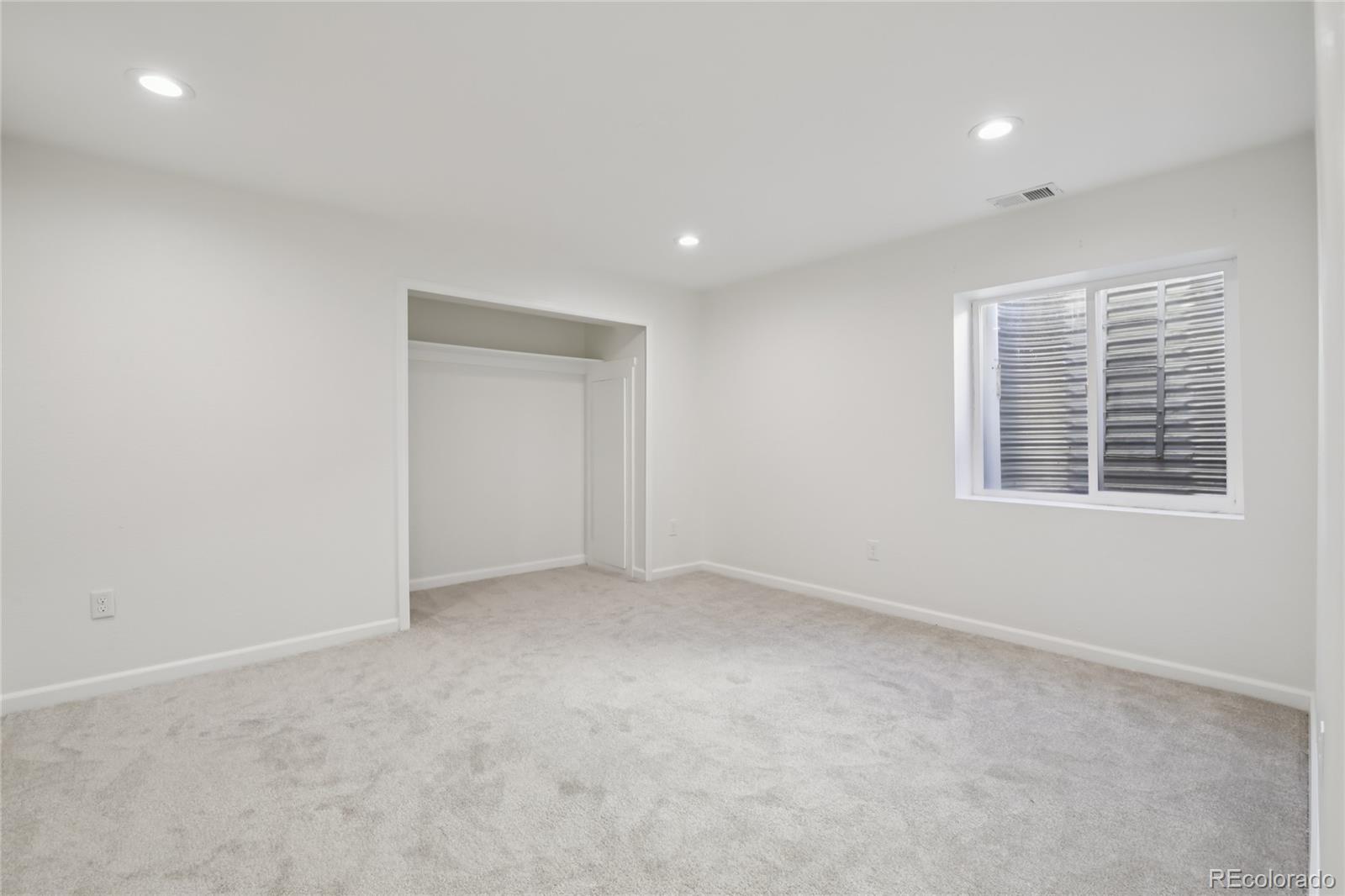 11340 Locust Street Thornton, CO 80233 - Photo 24 of 33 a view of an empty room with a window