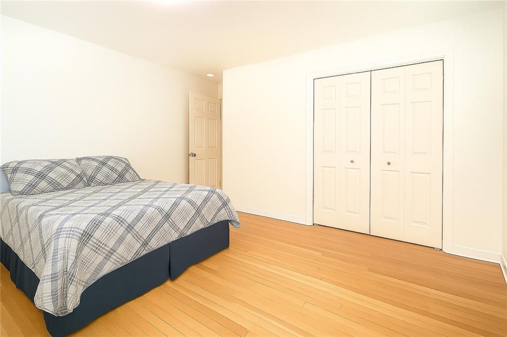 2115 Nichols Lane Decatur, GA 30032 - Photo 12 of 21 a bedroom with a bed and a mirror