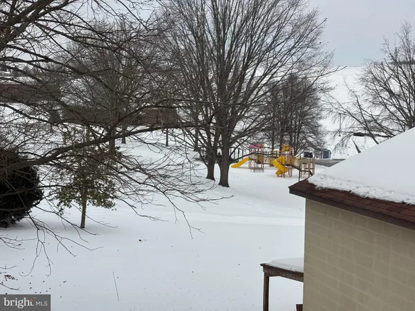 a view of snow on the road