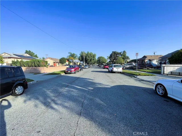a view of outdoor space with parked