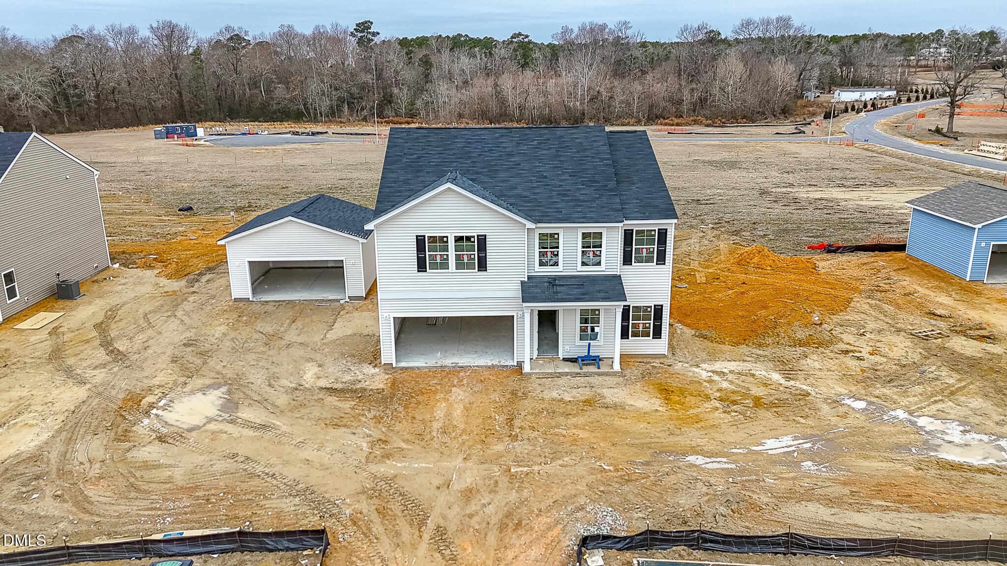 52 Osgood Street Angier, NC 27501 - Photo 2 of 8 a aerial view of a house with a yard