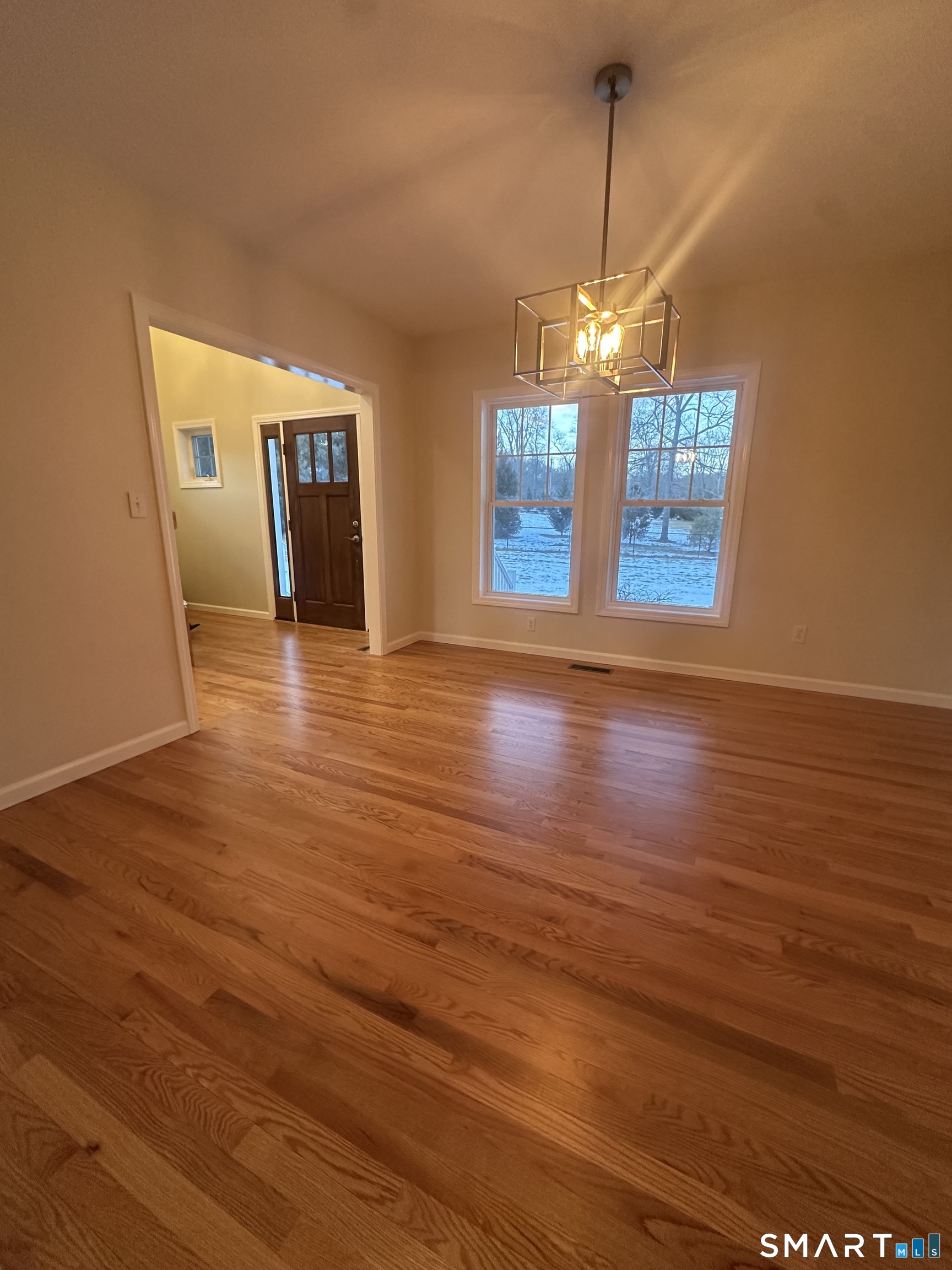 198 Green Hill Road Madison, CT 06443 - Photo 20 of 26 a view of a room with wooden floor