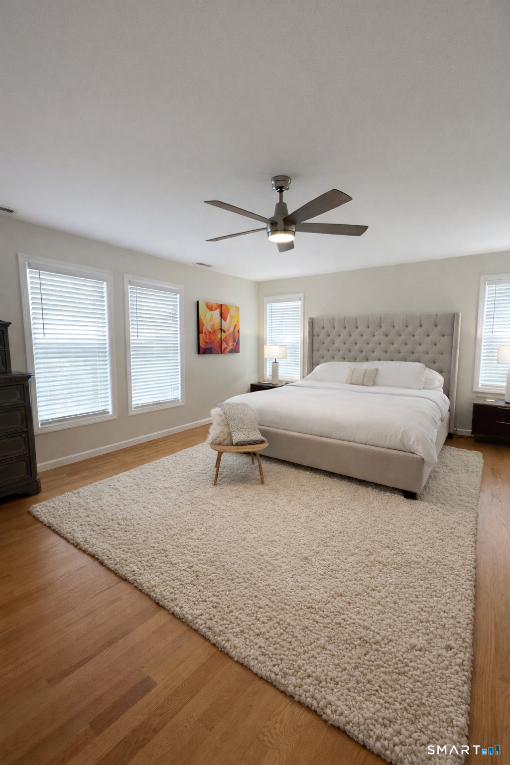 198 Green Hill Road Madison, CT 06443 - Photo 23 of 26 a bedroom with a large bed and a window