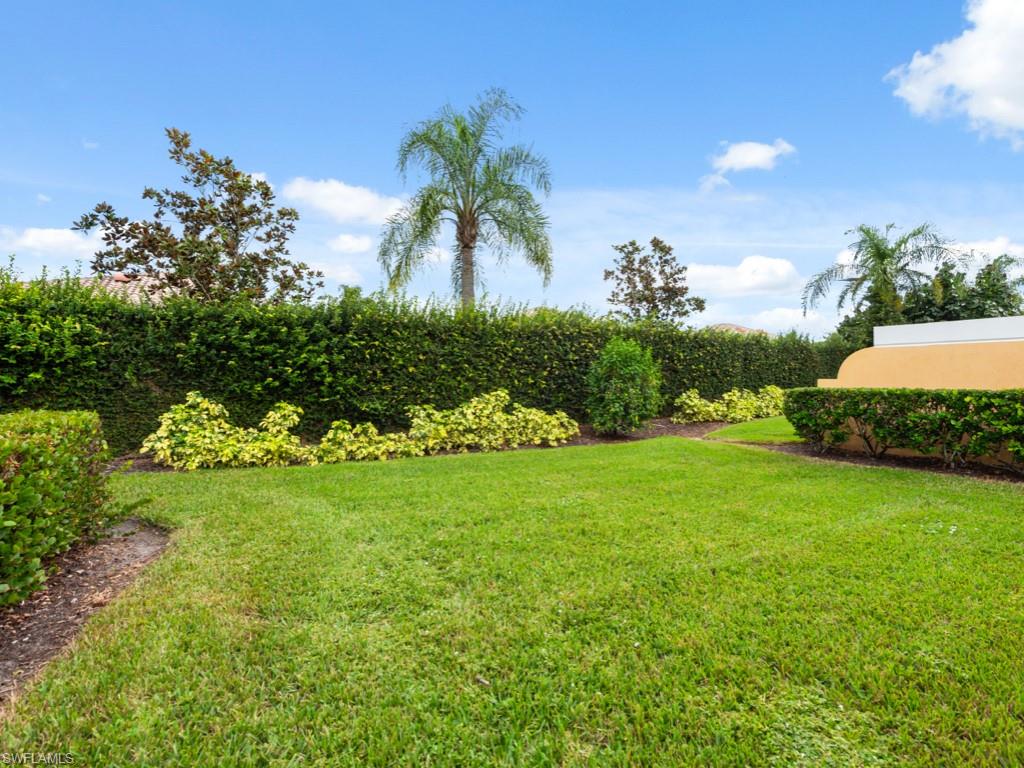 7520 Firenze Lane Naples, FL 34114 - Photo 21 of 32 a view of a garden