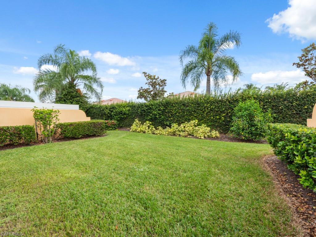 7520 Firenze Lane Naples, FL 34114 - Photo 22 of 32 a view of a garden