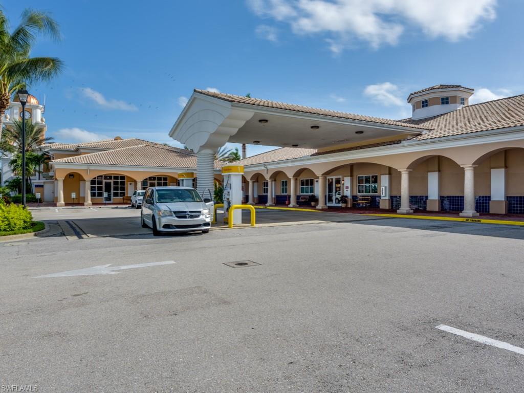 7520 Firenze Lane Naples, FL 34114 - Photo 25 of 32 a car parked in front of building