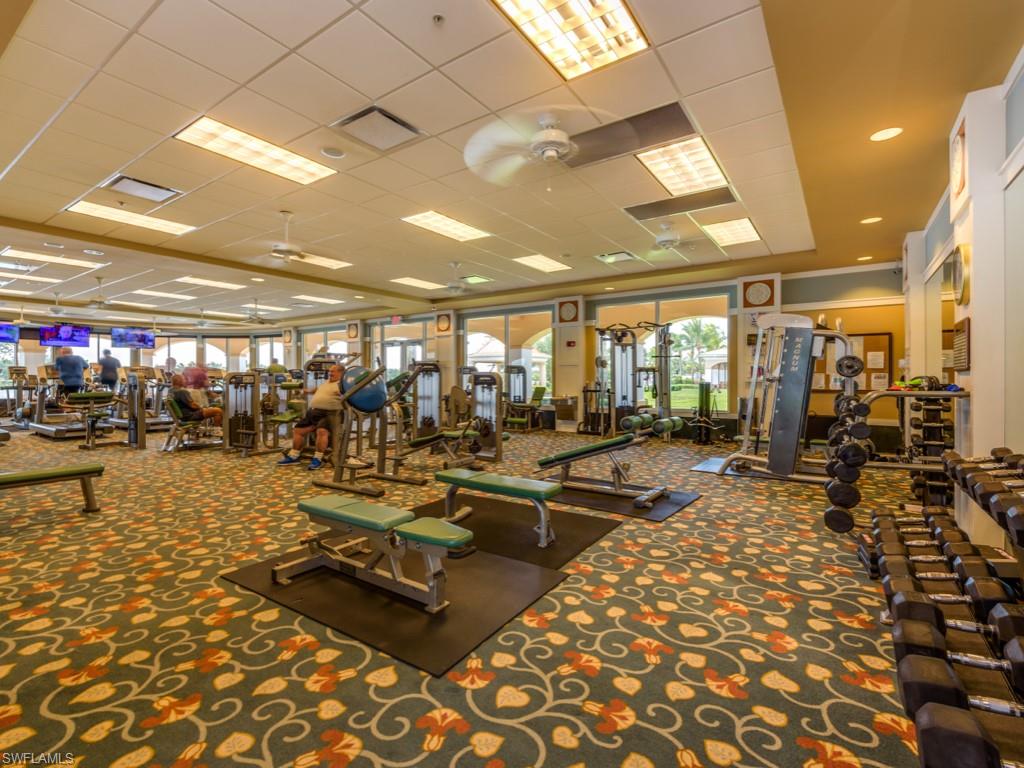 7520 Firenze Lane Naples, FL 34114 - Photo 26 of 32 a view of a room with gym equipment
