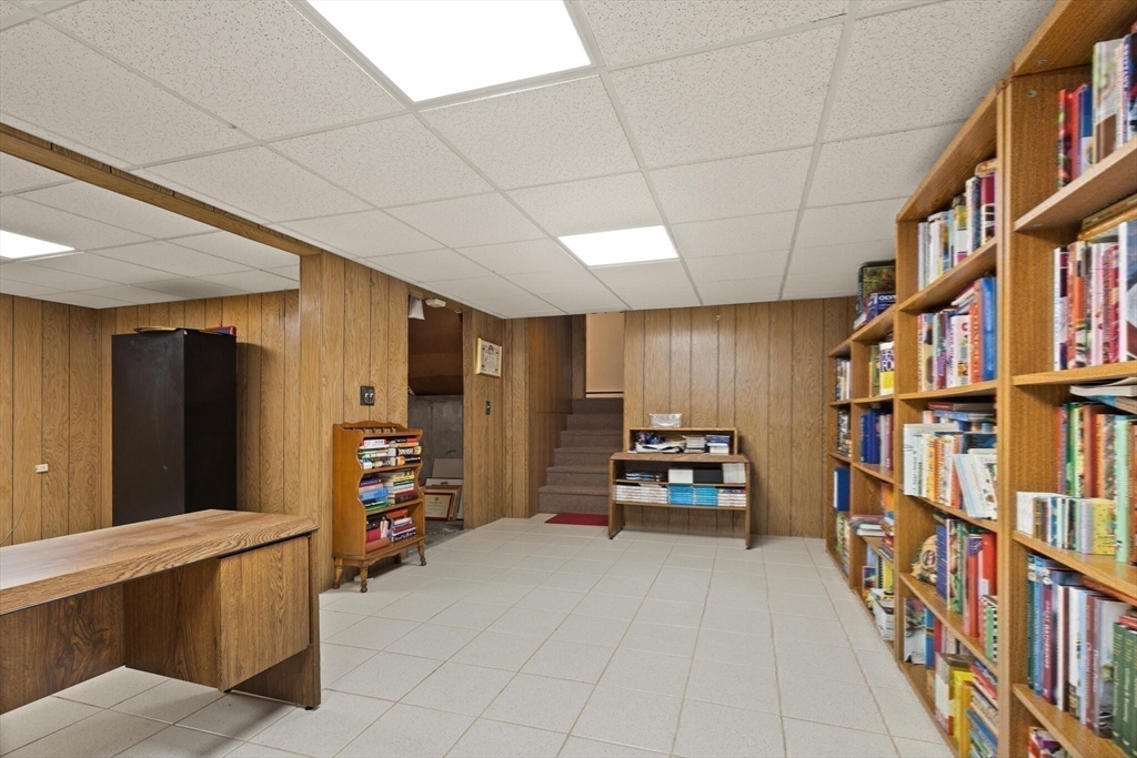 34 Ridgewood Road Westwood, MA 02090 - Photo 23 of 31 a bedroom with furniture and a book shelf