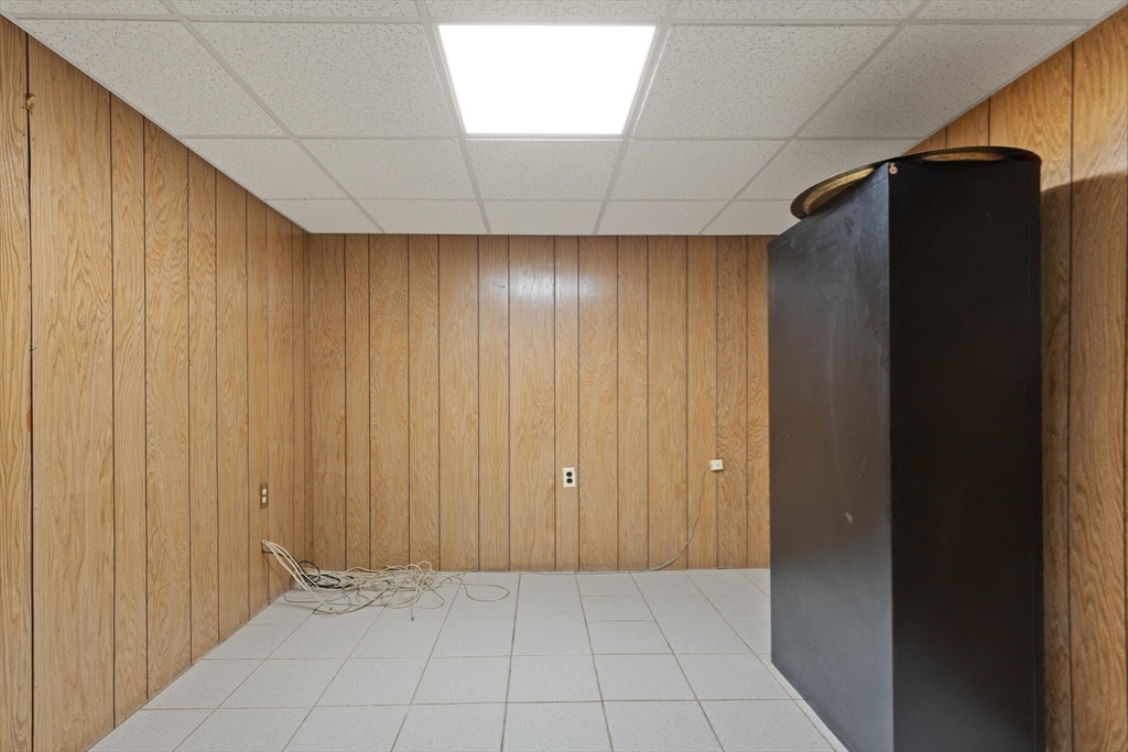 34 Ridgewood Road Westwood, MA 02090 - Photo 24 of 31 a view of entryway with wooden walls