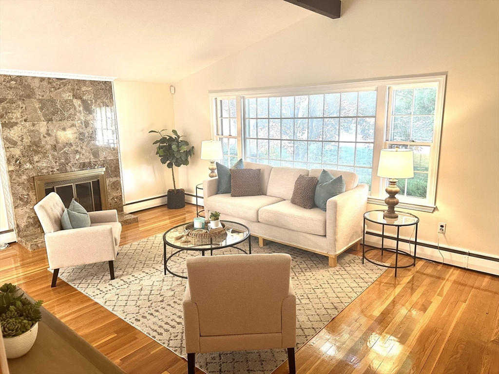 34 Ridgewood Road Westwood, MA 02090 - Photo 4 of 31 a living room with furniture and a large window
