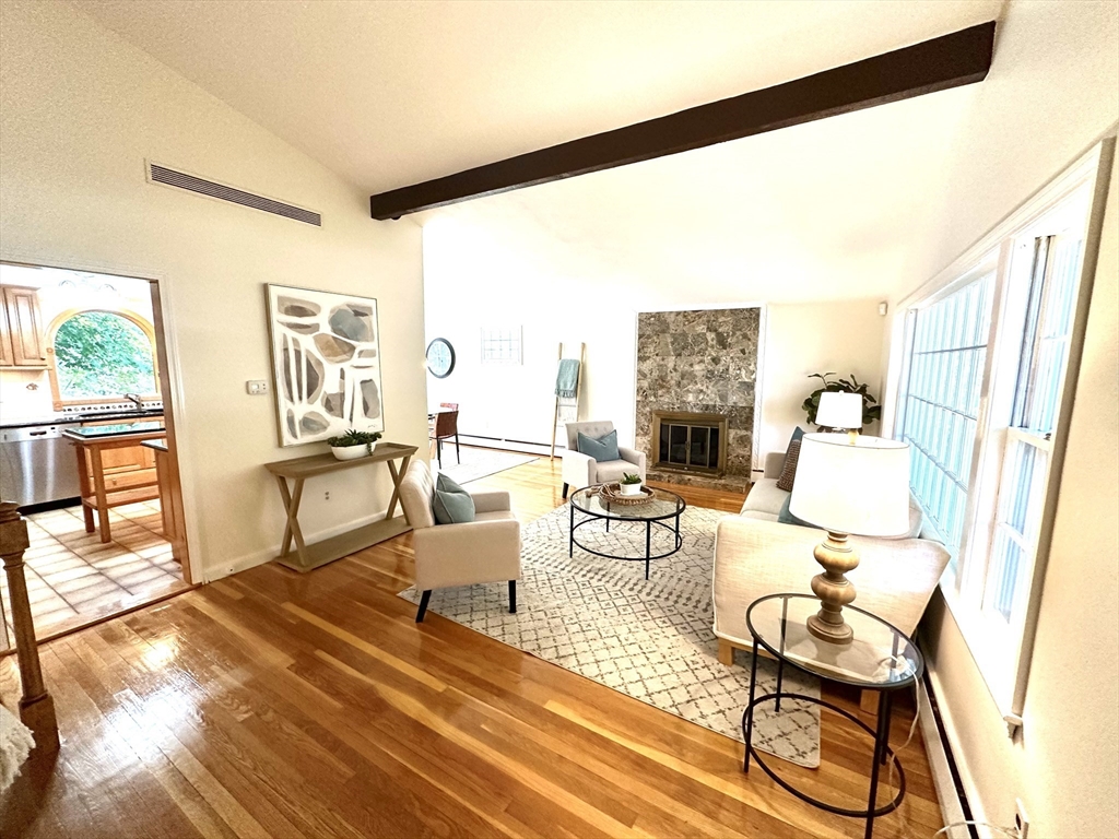 34 Ridgewood Road Westwood, MA 02090 - Photo 5 of 31 a living room with furniture and a floor to ceiling window