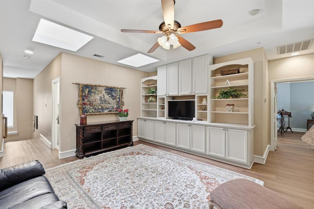 3413 Lantz Circle Plano, TX 75025 - Photo 21 of 38 a view of a livingroom with furniture and a flat screen tv