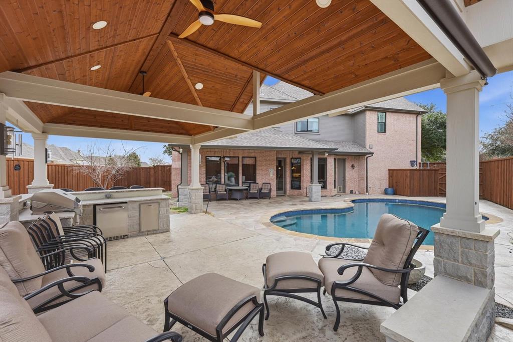 3413 Lantz Circle Plano, TX 75025 - Photo 35 of 38 a view of a patio with dining table and chairs with wooden floor