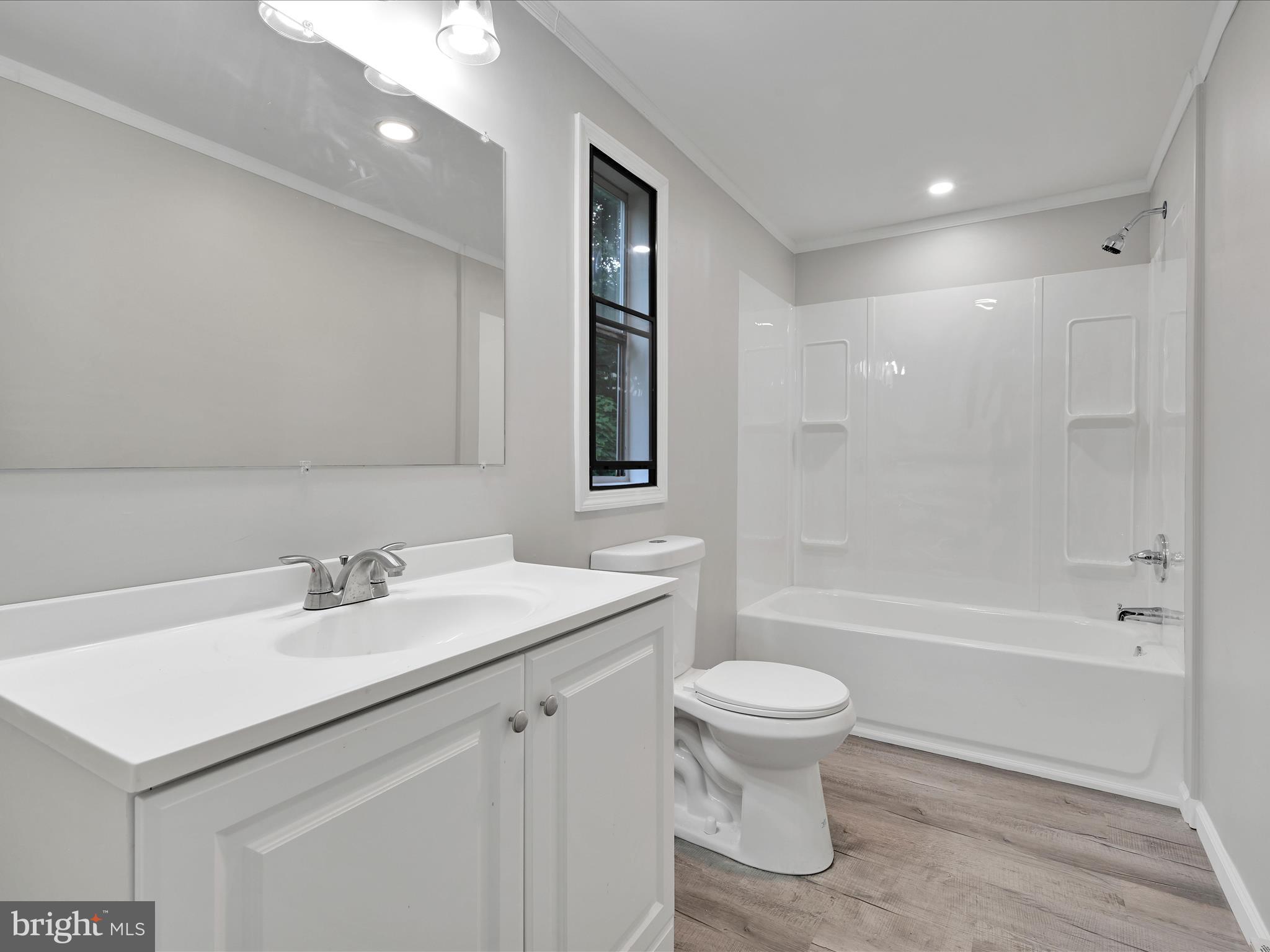 207 Mill Creek Road Kutztown, PA 19530 - Photo 13 of 26 a bathroom with a sink a toilet and shower