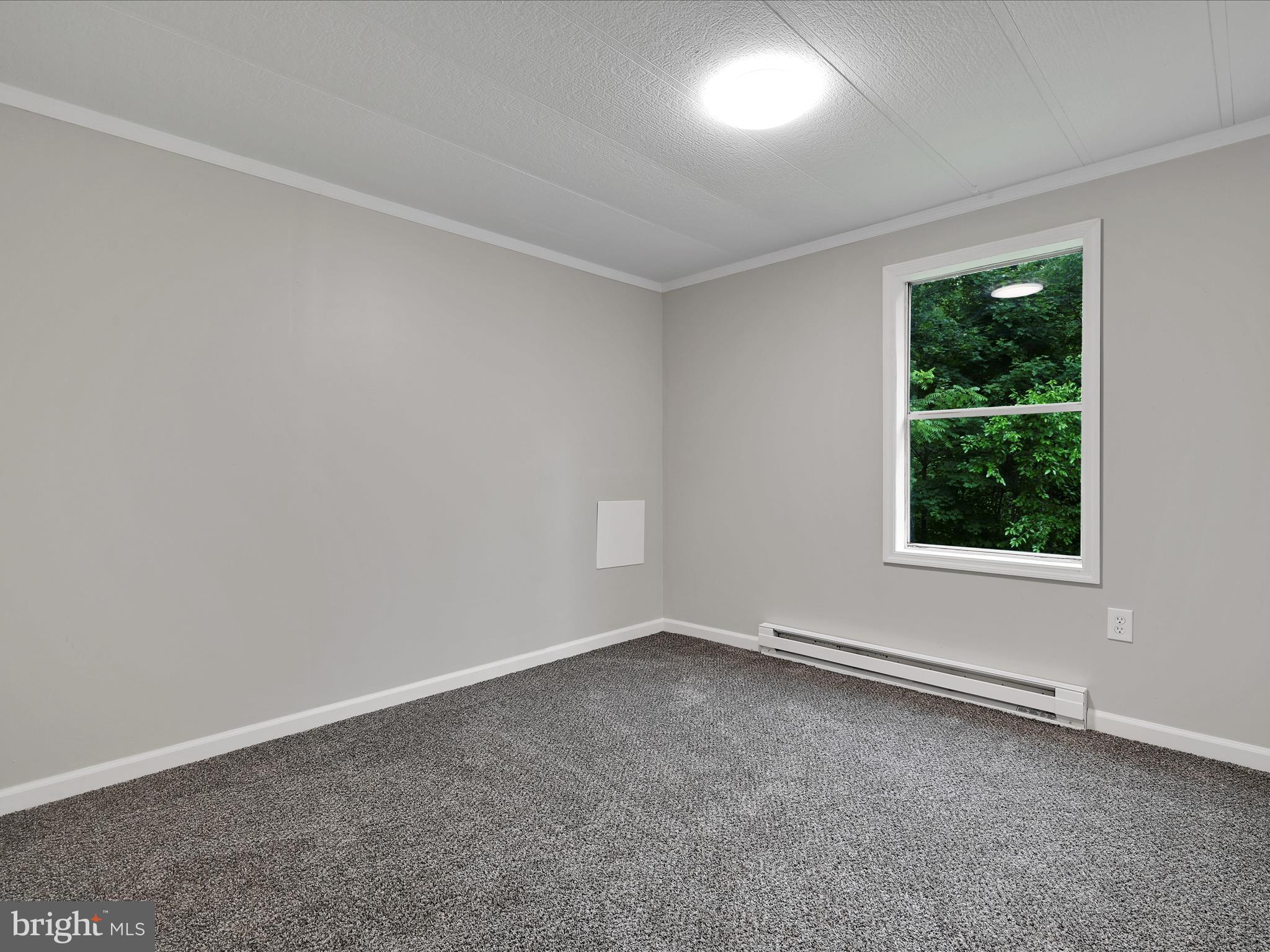207 Mill Creek Road Kutztown, PA 19530 - Photo 14 of 26 an empty room with a window