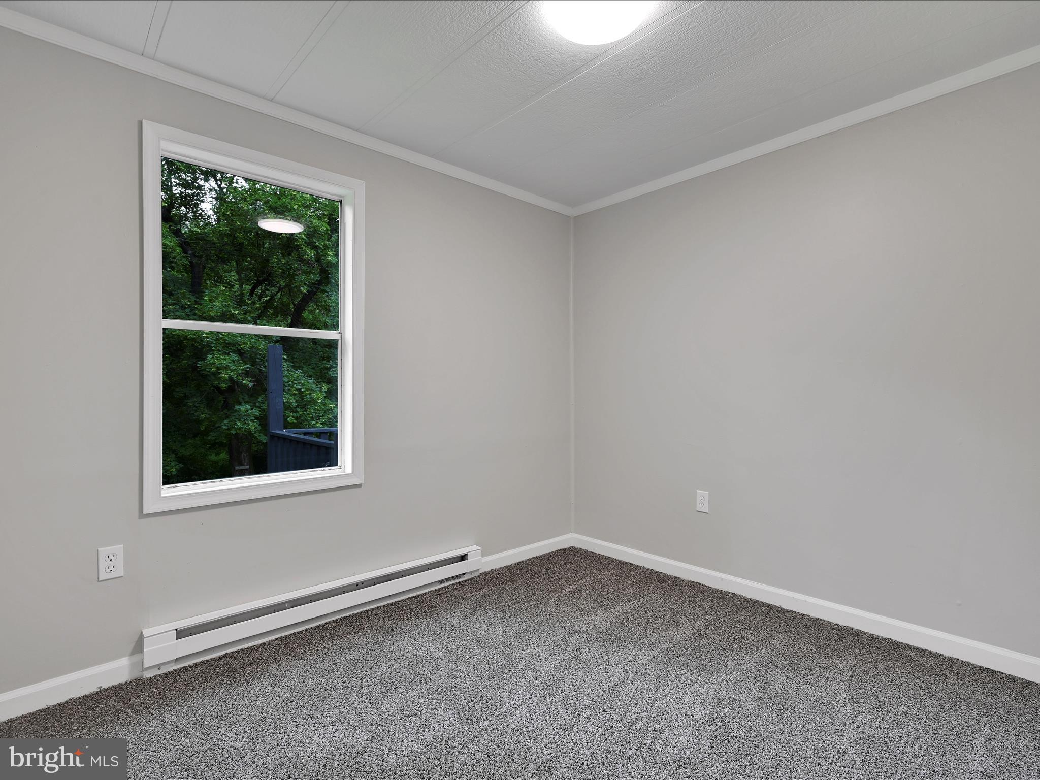 207 Mill Creek Road Kutztown, PA 19530 - Photo 16 of 26 an empty room with a window