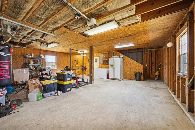 a view of the room with furniture