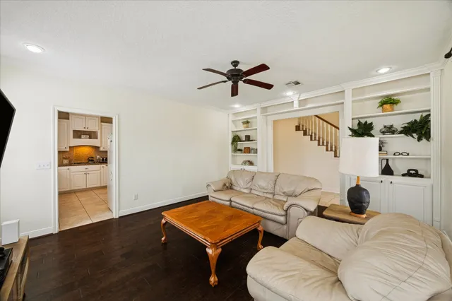 a bedroom with furniture and a gym equipment