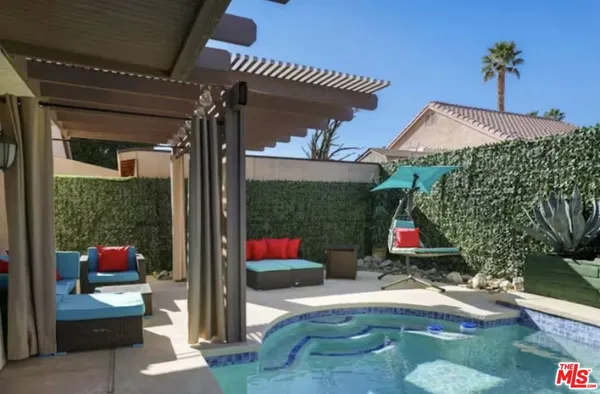 a outdoor space with lots of stuff and a fireplace