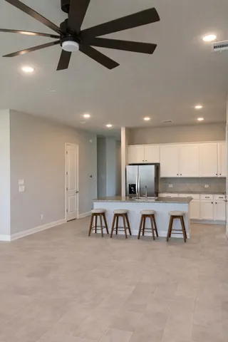 a bathroom with a toilet and a sink