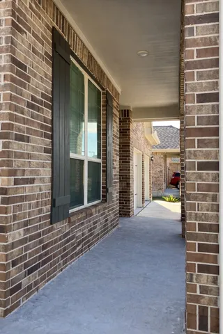 a kitchen with granite countertop a sink and a stove