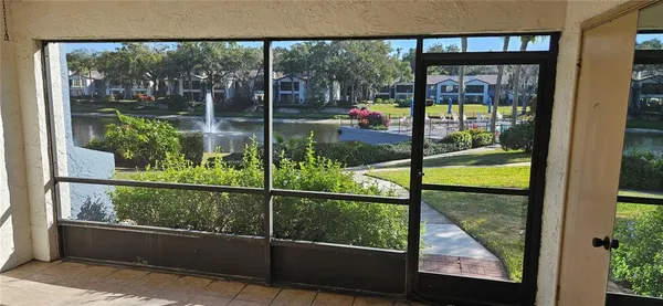 a kitchen with a refrigerator and a stove