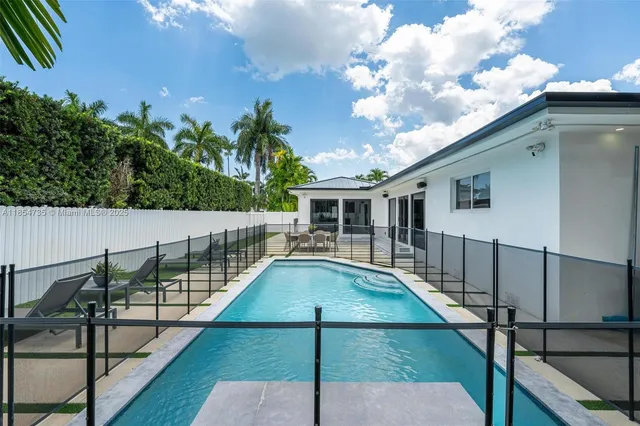 a view of a balcony with chairs